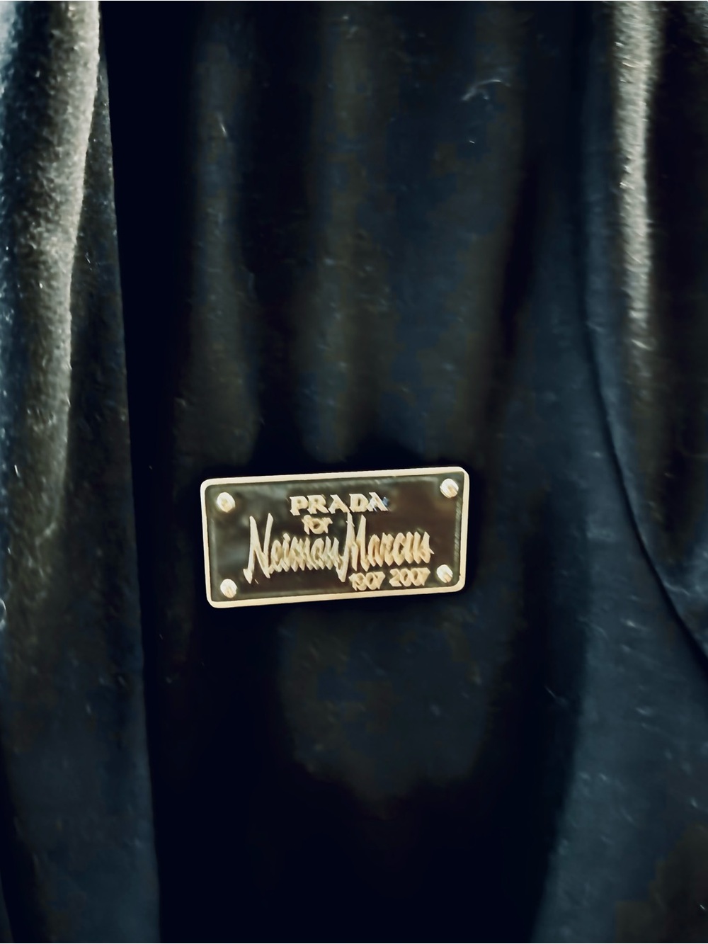 Prada in collaboration with Neiman Marcus's 100 years birthday big plaque/broche